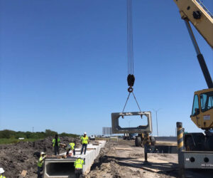 Crew setting box culverts on HWY 59 South in Victoria.